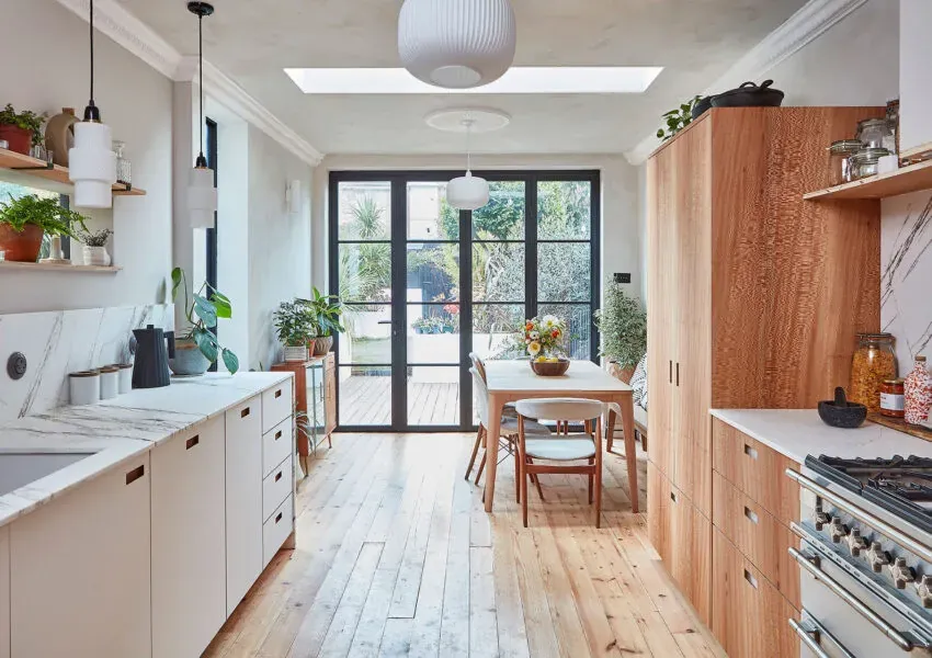 Light oak baseboard trim in a Scandinavian style kitchen