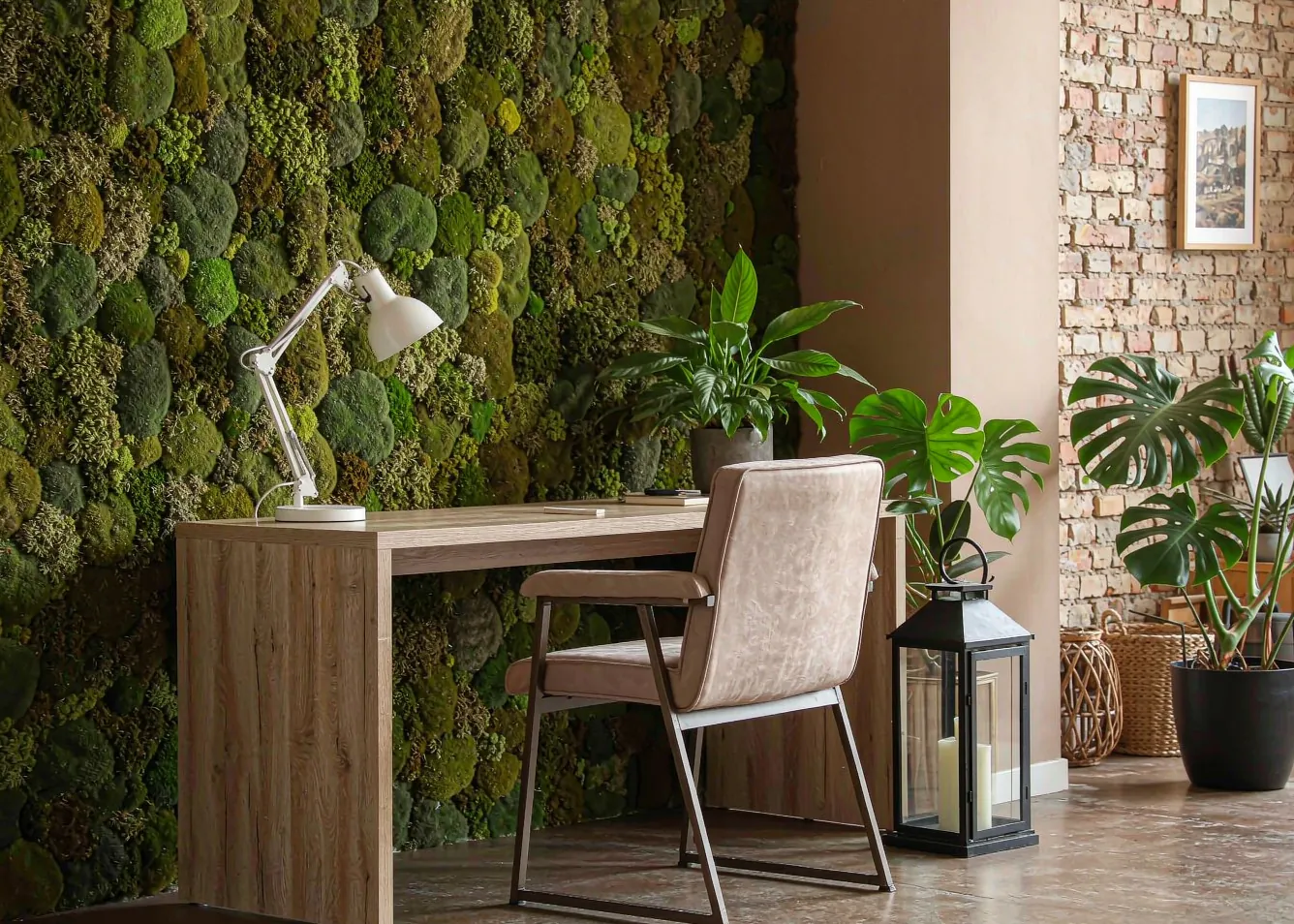 Biophilic design home office with living moss wall and natural materials
