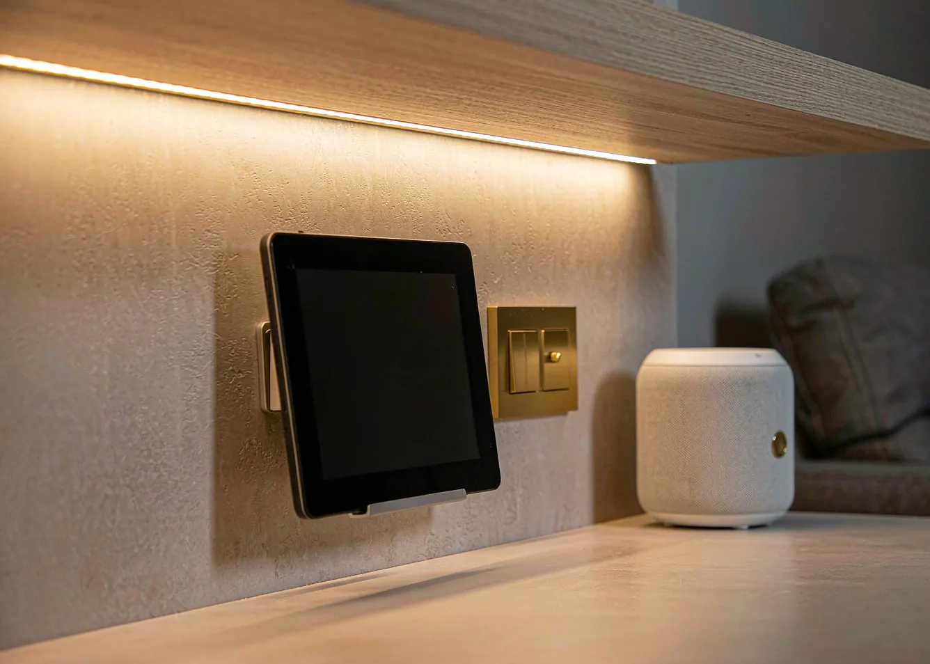 Smart home renovation with wall control panel and warm LED accent lighting