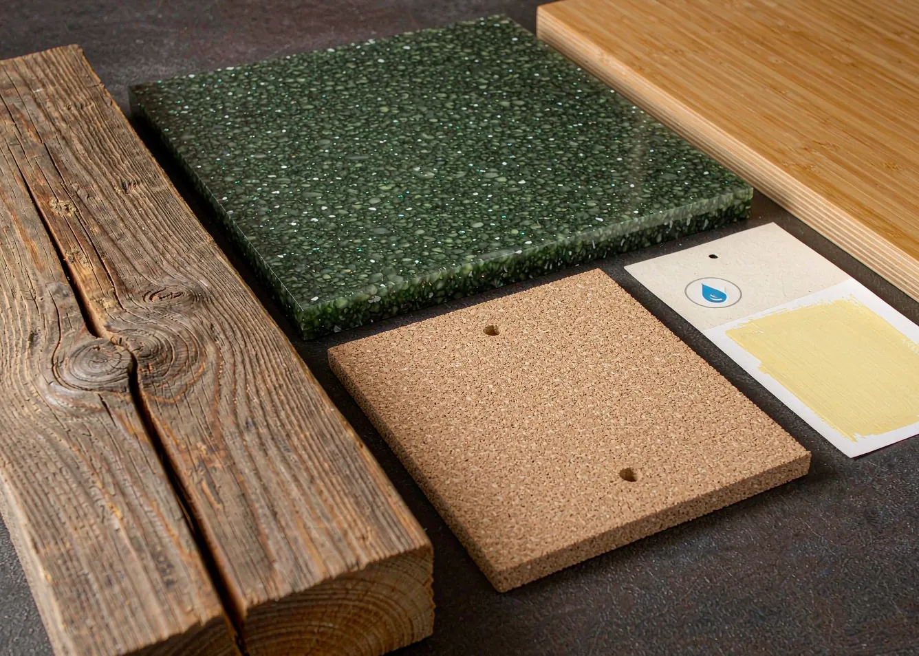 Sustainable renovation materials: reclaimed wood, cork, recycled glass, bamboo