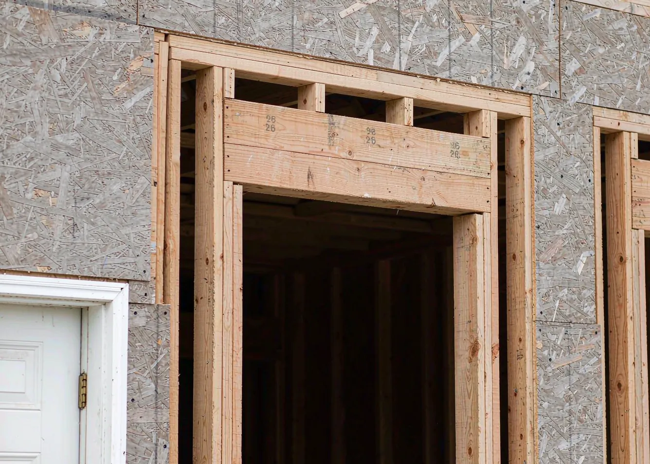 framed door rough opening showing king studs jack studs and double 2x6 header